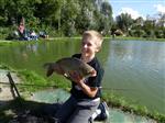(Groot)ouder met (Klein)kind vissen bij Toms Creek